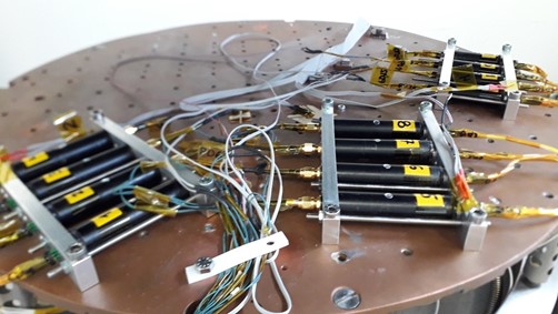 Lasers mounted on vacuum chamber baseplate