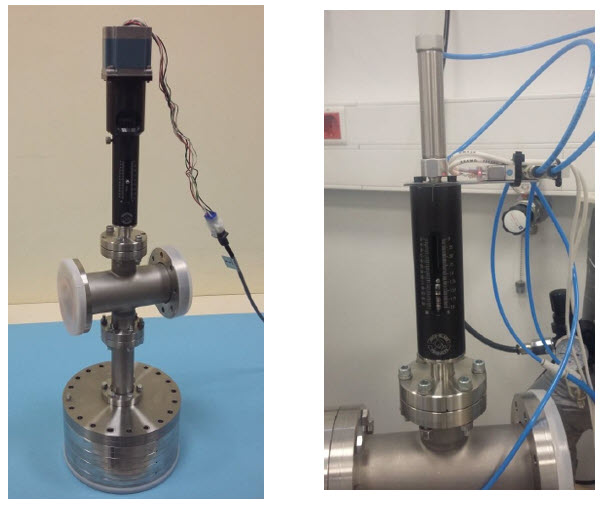 Vacuum chamber with mechanical positioner in the left and pneumatic system at the right