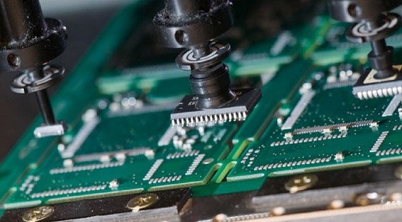 Figure 2 Pick&Place machine placing components on a PCB