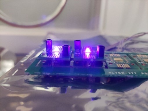 Figure 3. Blue LEDs biased on using the setup test board with spring contact connections